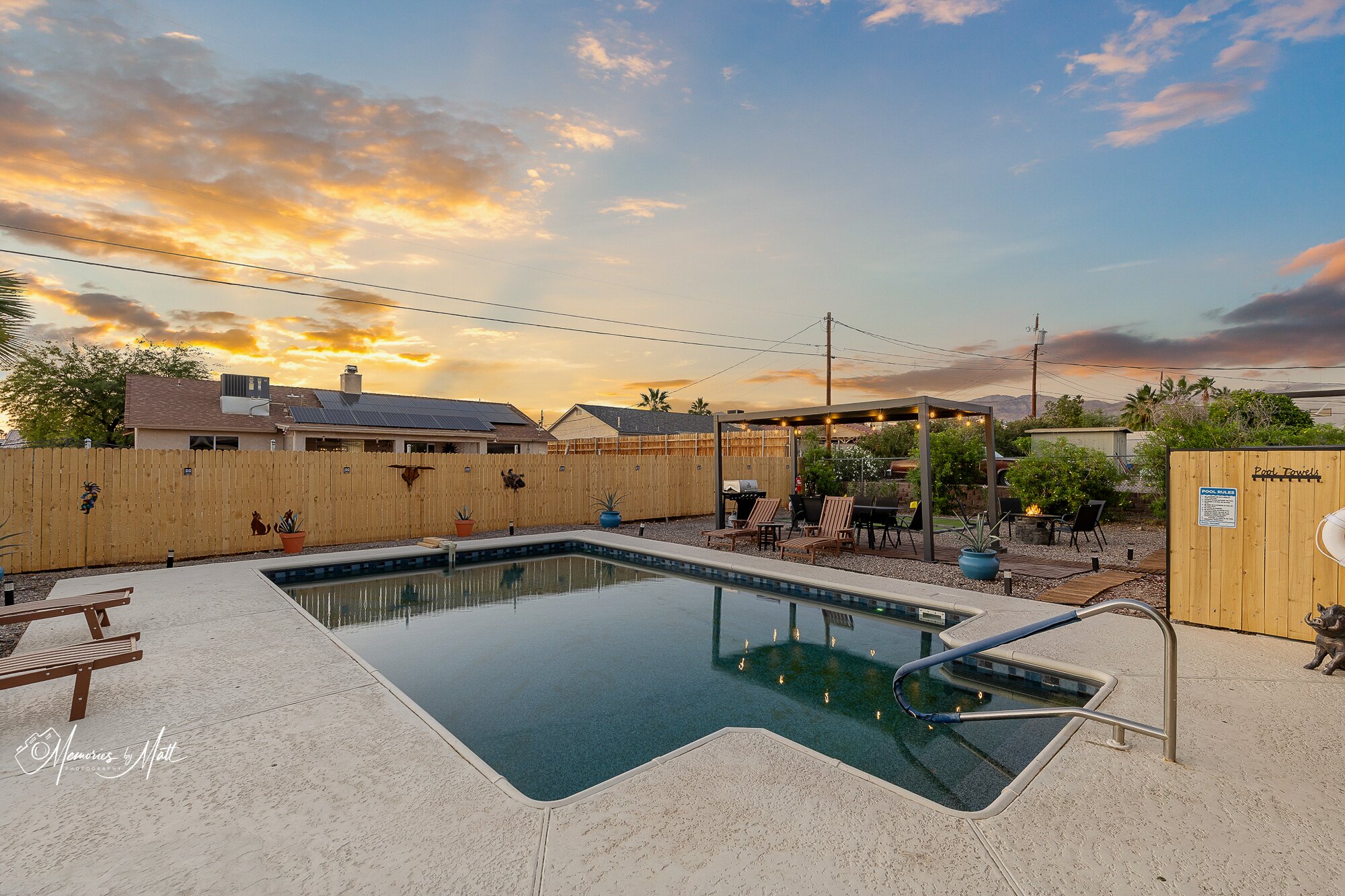 Twilight real estate photography of a backyard pool