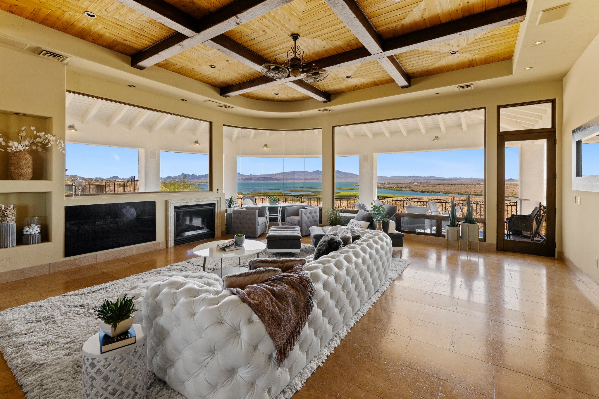 Real estate interior photography of a living room with a lake view